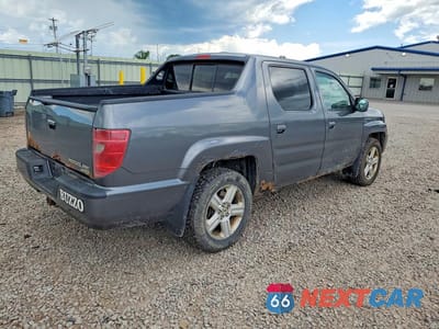 Trzecie zdjęcie samochodu z tyłu: 2010 HONDA RIDGELINE RTL VIN:5FPYK1F51AB004820 - miniatura