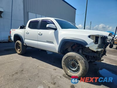 Czwarte zdjęcie samochodu z boku: 2018 TOYOTA TACOMA TRD OFF-ROAD VIN:3TMCZ5AN8JM141178 - miniatura