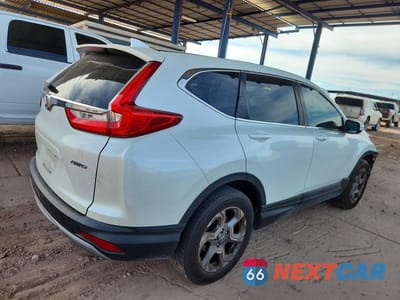 Trzecie zdjęcie samochodu z tyłu: 2018 HONDA CR-V EXL VIN:2HKRW2H83JH611270 - miniatura