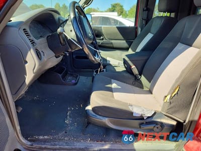 Zdjęcie 7 z 12 samochodu: 2010 FORD RANGER SUPER CAB VIN:1FTLR4FEXAPA29978 - miniatura