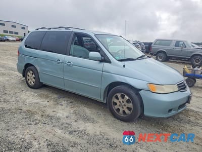 Czwarte zdjęcie samochodu z boku: 2003 HONDA ODYSSEY EXL VIN:5FNRL18973B085917 - miniatura