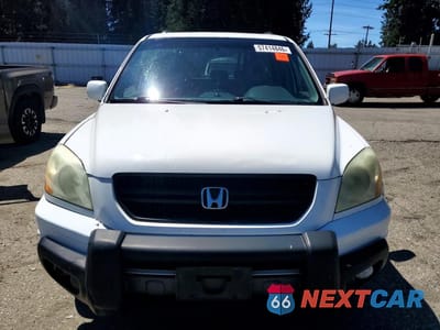 Piąte zdjęcie samochodu w środku: 2005 HONDA PILOT EXL VIN:2HKYF186X5H551739 - miniatura