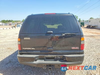 Zdjęcie 6 z 13 samochodu: 2005 GMC YUKON XL DENALI VIN:1GKFK66U85J246382 - miniatura