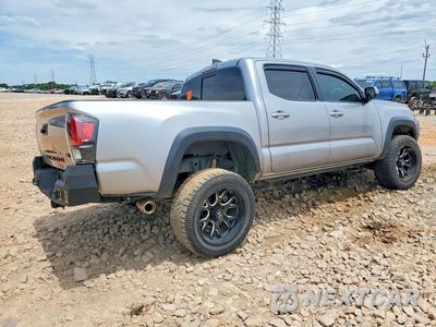 Trzecie zdjęcie samochodu z tyłu: 2021 TOYOTA TACOMA TRD OFF-ROAD VIN:3TMAZ5CN0MM145928 - miniatura