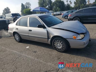 Czwarte zdjęcie samochodu z boku: 1999 TOYOTA COROLLA VE VIN:1NXBR12E6XZ153915 - miniatura