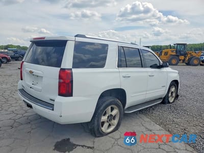 Trzecie zdjęcie samochodu z tyłu: 2018 CHEVROLET TAHOE K1500 PREMIER VIN:1GNSKCKC3JR239140 - miniatura
