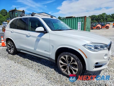 Czwarte zdjęcie samochodu z boku: 2016 BMW X5 XDR40E VIN:5UXKT0C52G0S78902 - miniatura