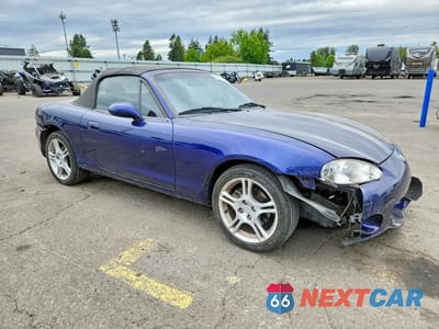 Czwarte zdjęcie samochodu z boku: 2004 MAZDA MX-5 MIATA BASE VIN:JM1NB353840410104 - miniatura