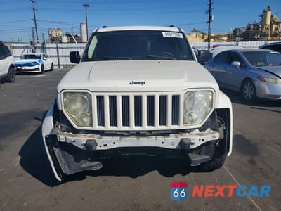 Piąte zdjęcie samochodu w środku: 2010 JEEP LIBERTY SPORT VIN:1J4PP2GK7AW107407 - miniatura