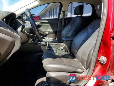 Zdjęcie 7 z 13 samochodu: 2017 FORD FOCUS TITANIUM VIN:1FADP3N22HL328139 - miniatura