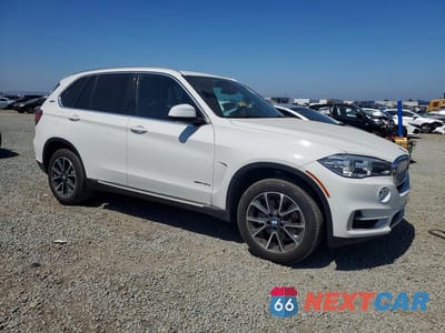 Czwarte zdjęcie samochodu z boku: 2017 BMW X5 XDR40E VIN:5UXKT0C33H0S80996 - miniatura