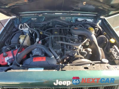 Zdjęcie 12 z 13 samochodu: 2000 JEEP CHEROKEE SPORT VIN:1J4FF48S9YL268300 - miniatura