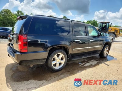Trzecie zdjęcie samochodu z tyłu: 2009 CHEVROLET SUBURBAN K1500 LTZ VIN:1GNFK36319R293611 - miniatura