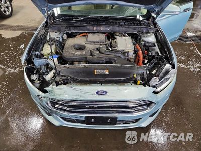 Zdjęcie 11 z 13 samochodu: 2013 FORD FUSION SE PHEV VIN:3FA6P0PU4DR302756 - miniatura