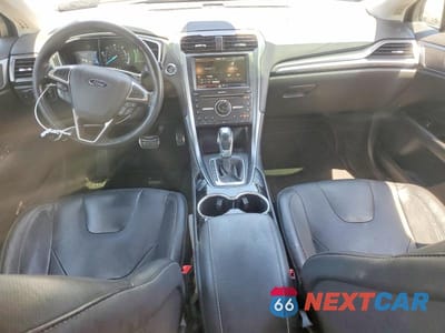 Zdjęcie 8 z 12 samochodu: 2016 FORD FUSION TITANIUM PHEV VIN:3FA6P0SU4GR320511 - miniatura