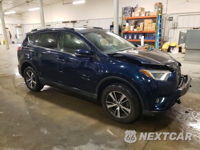 Czwarte zdjęcie samochodu z boku: 2017 TOYOTA RAV4 XLE AWD VIN:JTMRFREV9HJ708459 - miniatura