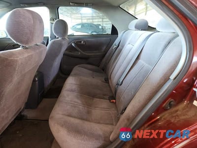 Zdjęcie 10 z 12 samochodu: 1999 TOYOTA CAMRY LE VIN:JT2BG22K6X0354350 - miniatura