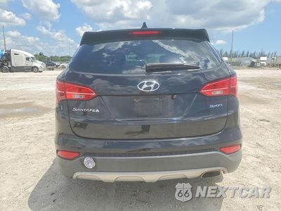 Zdjęcie 6 z 13 samochodu: 2016 HYUNDAI SANTA FE SPORT 2.4L VIN:5XYZT3LB7GG366782 - miniatura