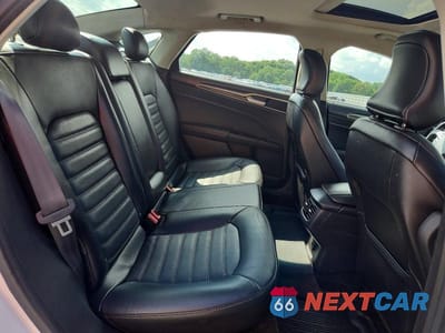 Zdjęcie 10 z 12 samochodu: 2016 FORD FUSION SE VIN:3FA6P0H9XGR130313 - miniatura