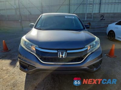 Piąte zdjęcie samochodu w środku: 2015 HONDA CR-V LX VIN:2HKRM3H33FH510317 - miniatura