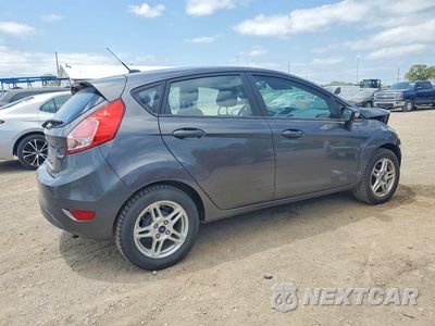 Trzecie zdjęcie samochodu z tyłu: 2017 FORD FIESTA SE VIN:3FADP4EJ3HM132853 - miniatura