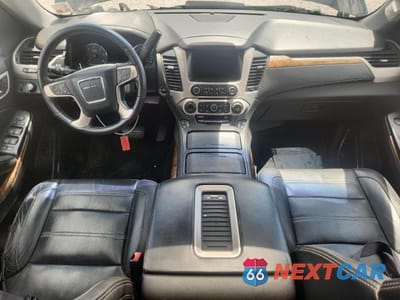 Zdjęcie 8 z 13 samochodu: 2015 GMC YUKON DENALI VIN:1GKS1CKJ5FR632403 - miniatura