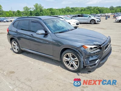 Czwarte zdjęcie samochodu z boku: 2014 BMW X1 SDRIVE28I VIN:WBAVM1C58EVW46918 - miniatura