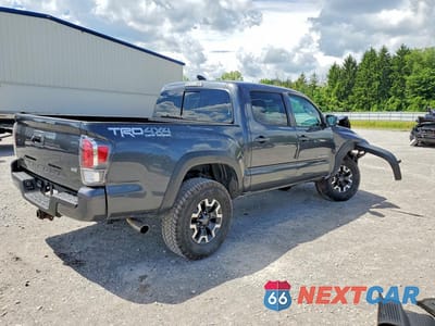 Trzecie zdjęcie samochodu z tyłu: 2020 TOYOTA TACOMA TRD OFF-ROAD VIN:3TMCZ5AN8LM369152 - miniatura