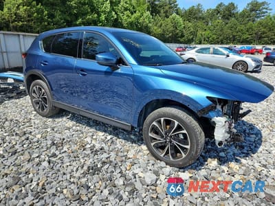 Czwarte zdjęcie samochodu z boku: 2023 MAZDA CX-5 PREMIUM VIN:JM3KFBDM5P0147156 - miniatura