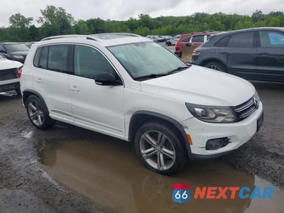 Czwarte zdjęcie samochodu z boku: 2017 VOLKSWAGEN TIGUAN SPORT VIN:WVGUV7AX9HK020427 - miniatura