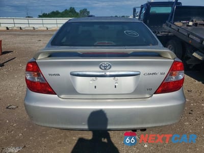 Zdjęcie 6 z 12 samochodu: 2002 TOYOTA CAMRY XLE V6 VIN:4T1BF30K22U513896 - miniatura