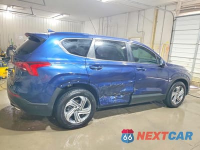 Trzecie zdjęcie samochodu z tyłu: 2021 HYUNDAI SANTA FE SE VIN:5NMS14AJ6MH364837 - miniatura