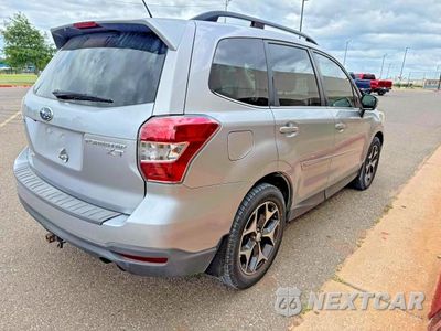Czwarte zdjęcie samochodu z boku: 2014 SUBARU FORESTER 2.0XT TOURING VIN:JF2SJGPC9EH473176 - miniatura