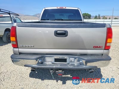 Zdjęcie 6 z 12 samochodu: 2001 GMC NEW SIERRA K1500 VIN:2GTEK19T911116936 - miniatura