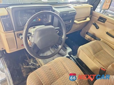 Zdjęcie 8 z 14 samochodu: 1999 JEEP WRANGLER / TJ SE VIN:1J4FY29P3XP466242 - miniatura