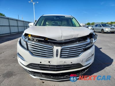 Piąte zdjęcie samochodu w środku: 2015 LINCOLN MKC VIN:5LMCJ2A92FUJ30780 - miniatura