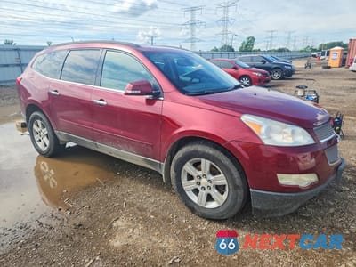Czwarte zdjęcie samochodu z boku: 2010 CHEVROLET TRAVERSE LT VIN:1GNLVGEDXAJ210384 - miniatura