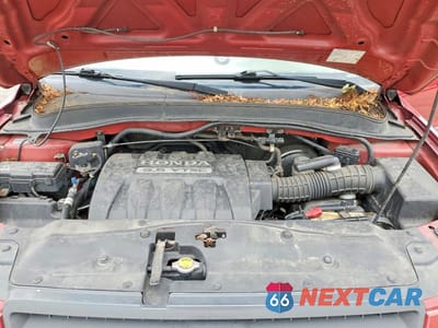 Zdjęcie 12 z 13 samochodu: 2005 HONDA PILOT LX VIN:2HKYF18145H551546 - miniatura