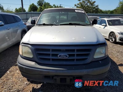 Piąte zdjęcie samochodu w środku: 2002 FORD F-150 VIN:1FTRX17242NB29395 - miniatura