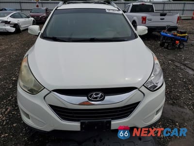 Piąte zdjęcie samochodu w środku: 2012 HYUNDAI TUCSON LIMITED VIN:KM8JUCAC0CU405268 - miniatura