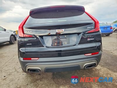 Zdjęcie 6 z 13 samochodu: 2019 CADILLAC XT4 PREMIUM LUXURY VIN:1GYFZDR47KF210599 - miniatura