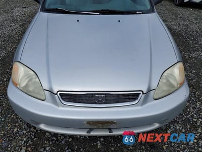 Zdjęcie 11 z 12 samochodu: 1998 HONDA CIVIC LX VIN:2HGEJ6673WH537980 - miniatura