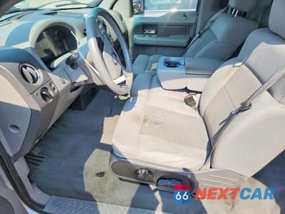 Zdjęcie 7 z 12 samochodu: 2004 FORD F150 VIN:1FTRF12W54NA24431 - miniatura