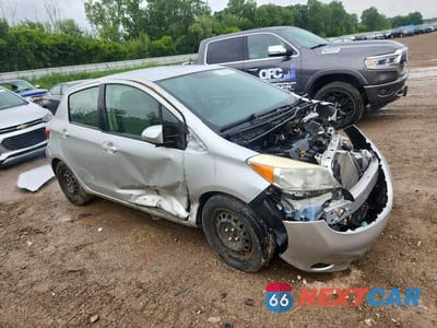 Czwarte zdjęcie samochodu z boku: 2012 TOYOTA YARIS 5-DOOR L VIN:JTDKTUD38CD514378 - miniatura