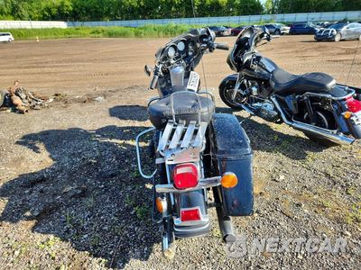 Czwarte zdjęcie samochodu z boku: 1999 HARLEY-DAVIDSON FLHT VIN:1HD1DDV18XY637181 - miniatura