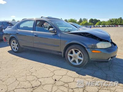 Czwarte zdjęcie samochodu z boku: 2001 NISSAN MAXIMA GXE VIN:JN1CA31D71T631277 - miniatura