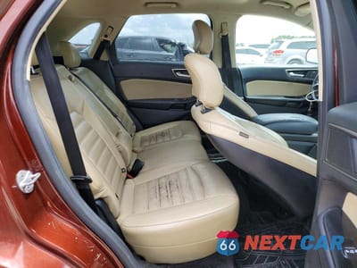 Zdjęcie 11 z 13 samochodu: 2016 FORD EDGE SEL VIN:2FMPK3J90GBC36658 - miniatura
