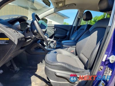 Zdjęcie 7 z 13 samochodu: 2011 HYUNDAI TUCSON GLS VIN:KM8JU3AC2BU134714 - miniatura
