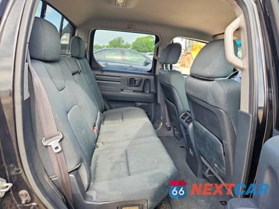 Zdjęcie 10 z 13 samochodu: 2012 HONDA RIDGELINE SPORT VIN:5FPYK1F79CB002026 - miniatura