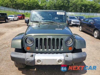 Piąte zdjęcie samochodu w środku: 2009 JEEP WRANGLER UNLIMITED SAHARA VIN:1J4GA59159L733168 - miniatura